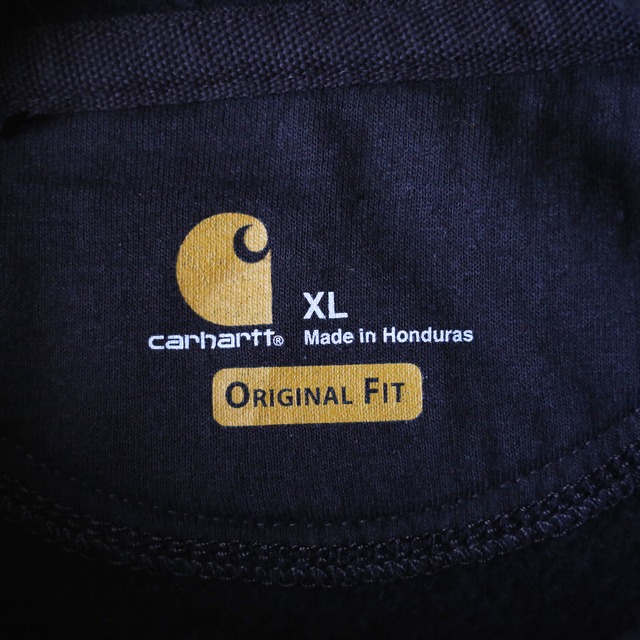 "Carhartt" sleeve logo printed over silhouette brown sweat parka