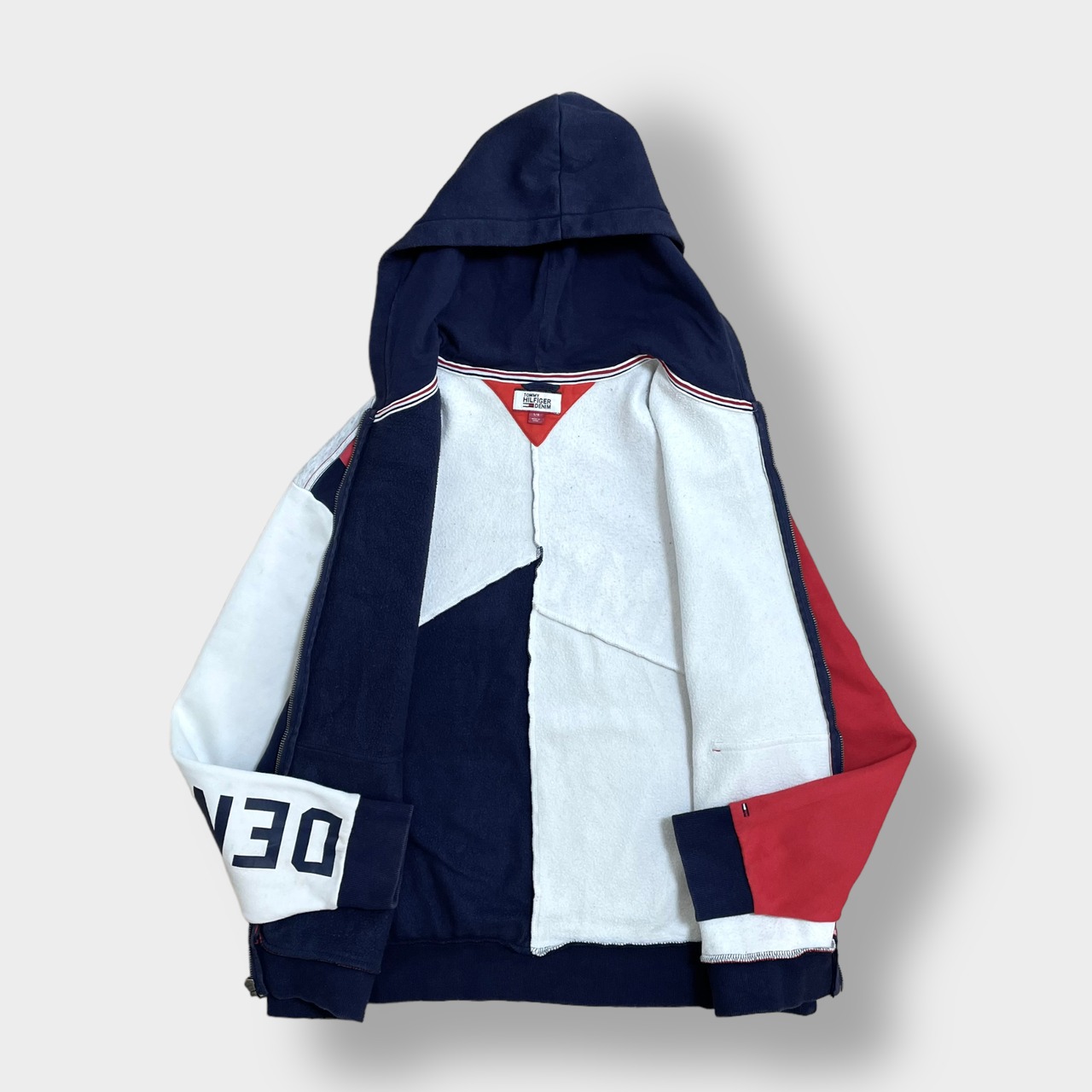 TOMMY HILFIGER DENIM ジップアップ パーカー クレイジーパターン フーディー スウェット プリント 袖ロゴ 切替 刺繍ロゴ L マルチカラー トミーヒルフィガー  US古着