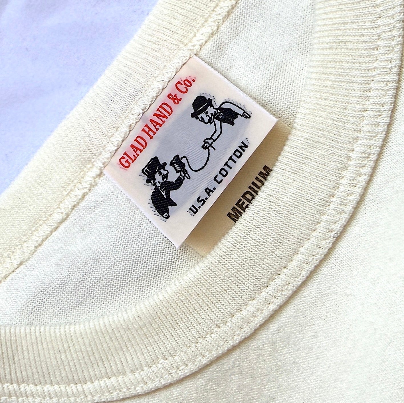 WOLFMAN BARBER SHOP × SHORKY WORLD CHAMPION T-shirt | WOLFMAN