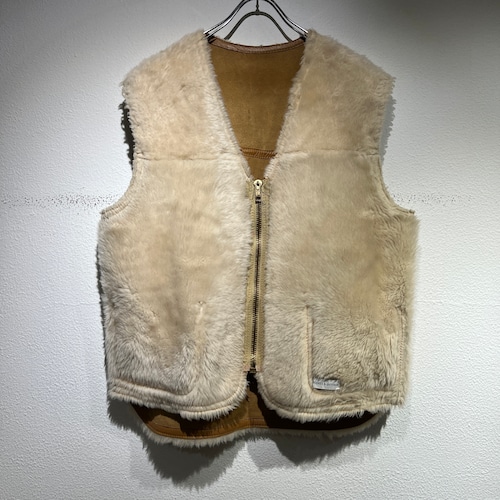 used reversible boa vest