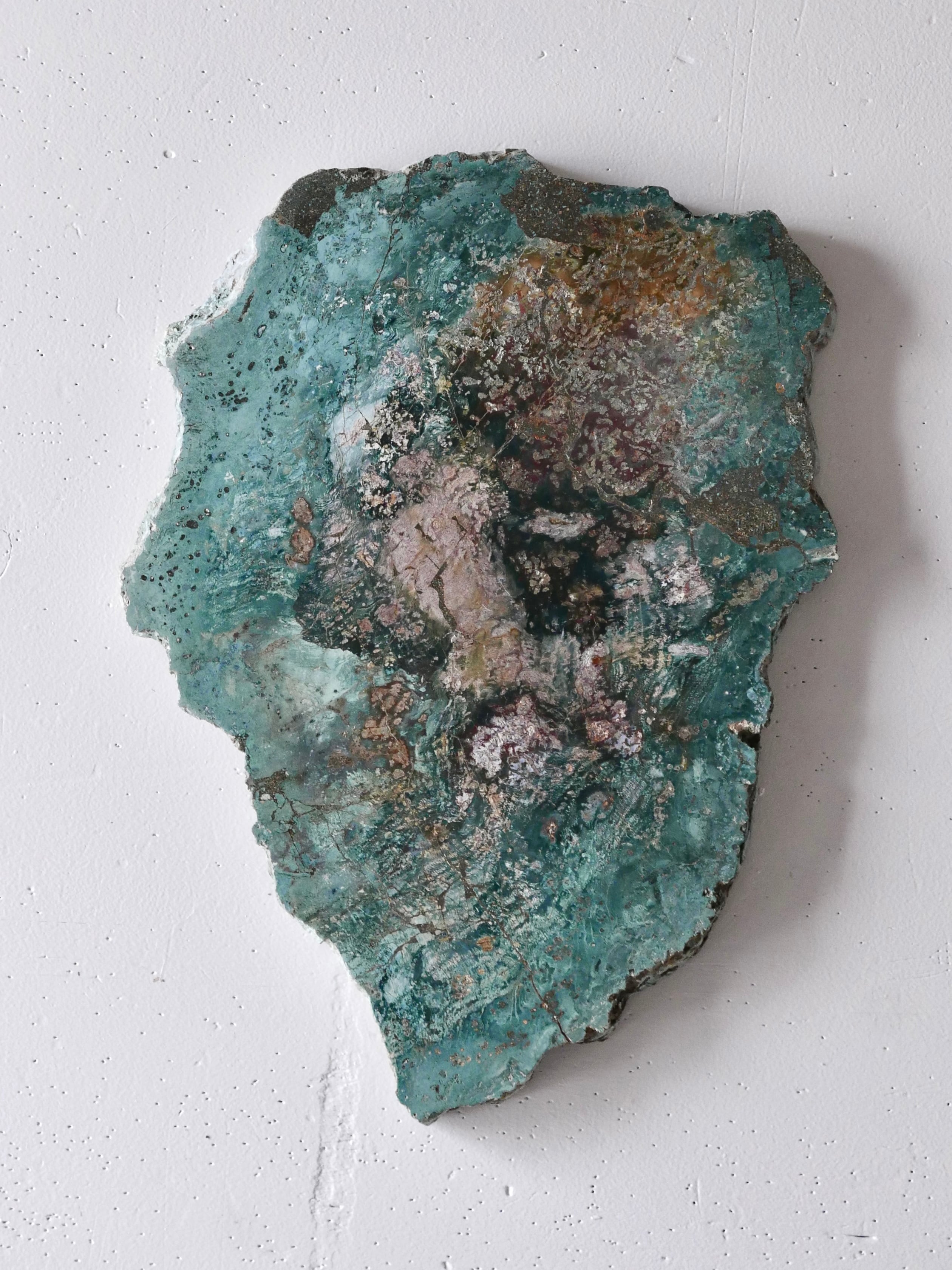 petrified wood plate , blue green , like an abstract painting