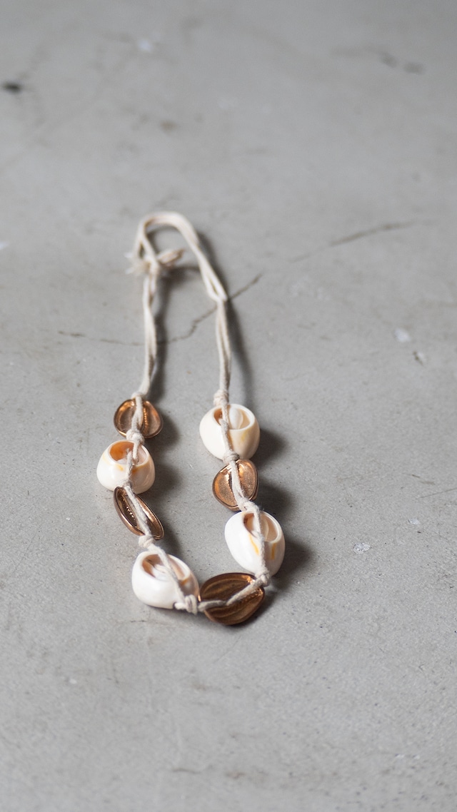 unknown used Cowrie and brass necklace