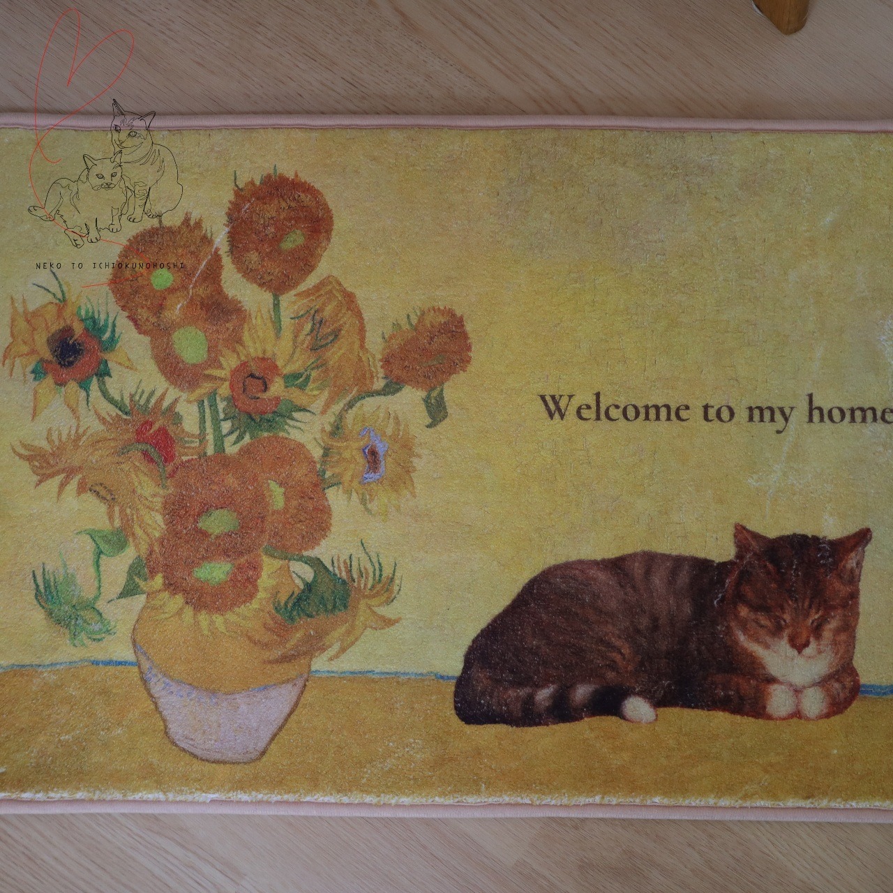 ひまわりと猫　
