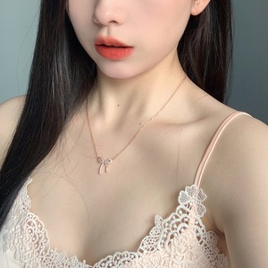 おしゃれ キラキラ リボン 結び目 ネックレス