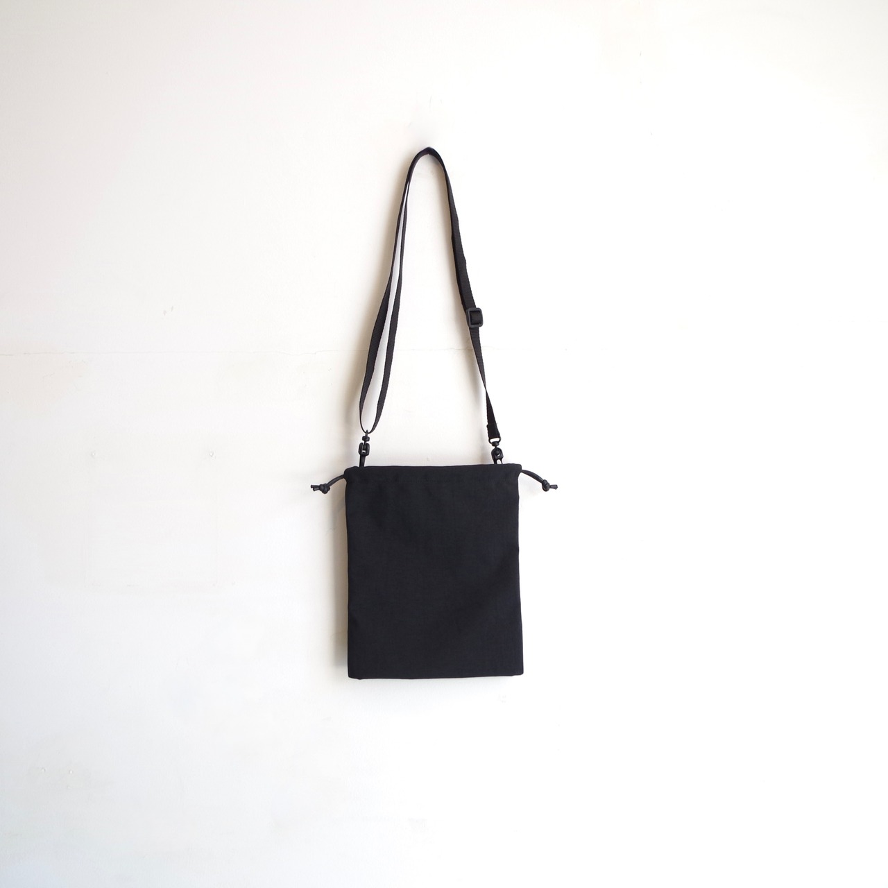 E R A. TAS FLAT KINCHAKU SMALL K045T