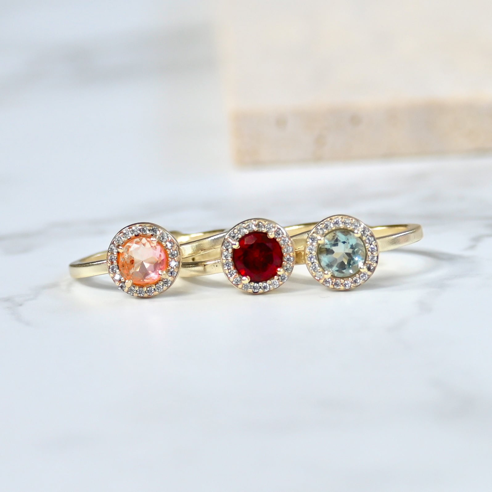 Atelier Mon(アトリエモン)3連オープンリング〈ローズダブレット、ガーネット、ブルートパーズ〉