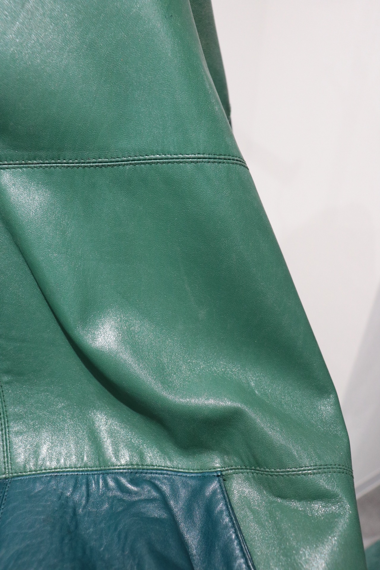SAXONY green leather hooded half zip jacket
