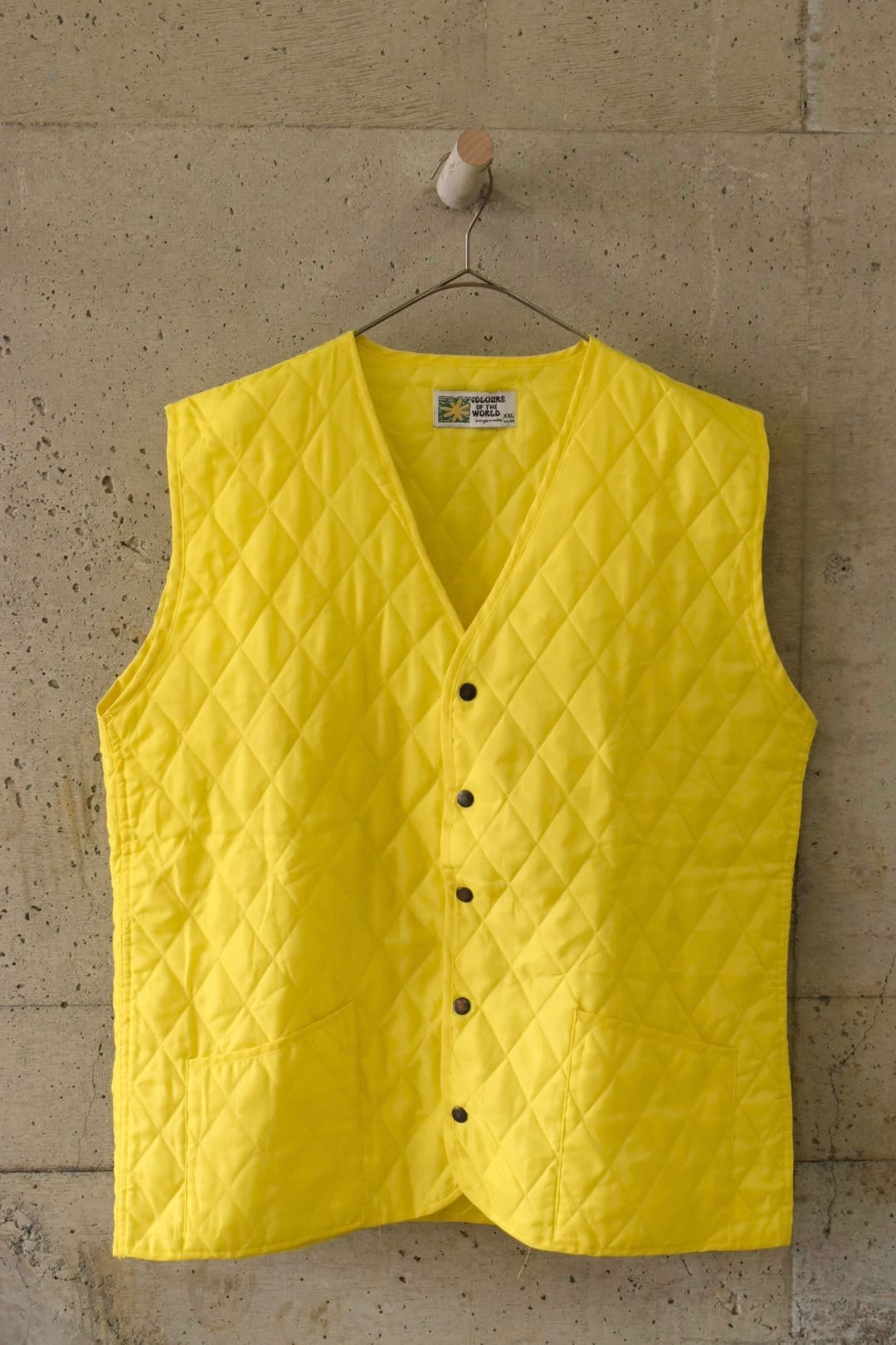 Oversized yellow quilted vest