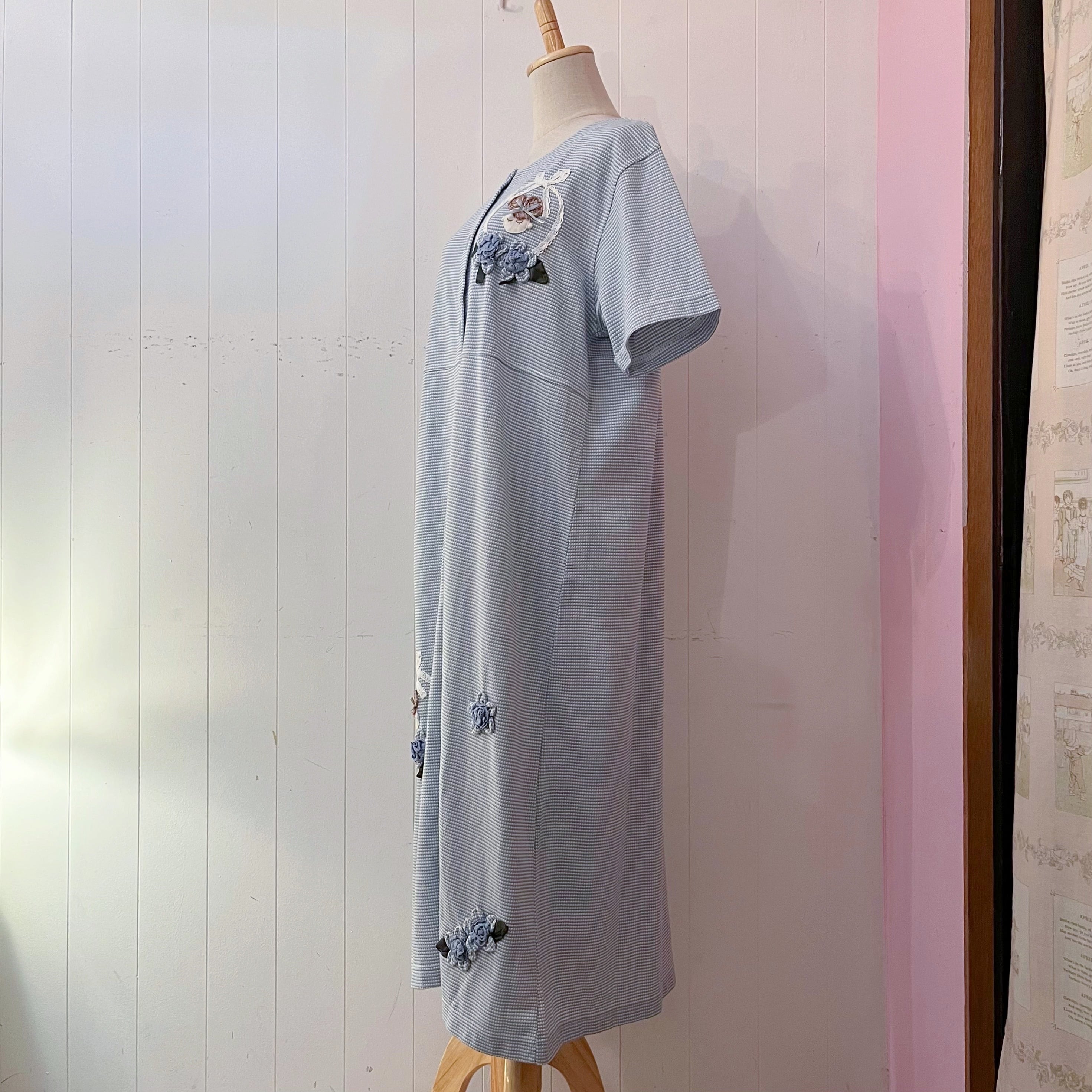 doll applique light blue one-piece