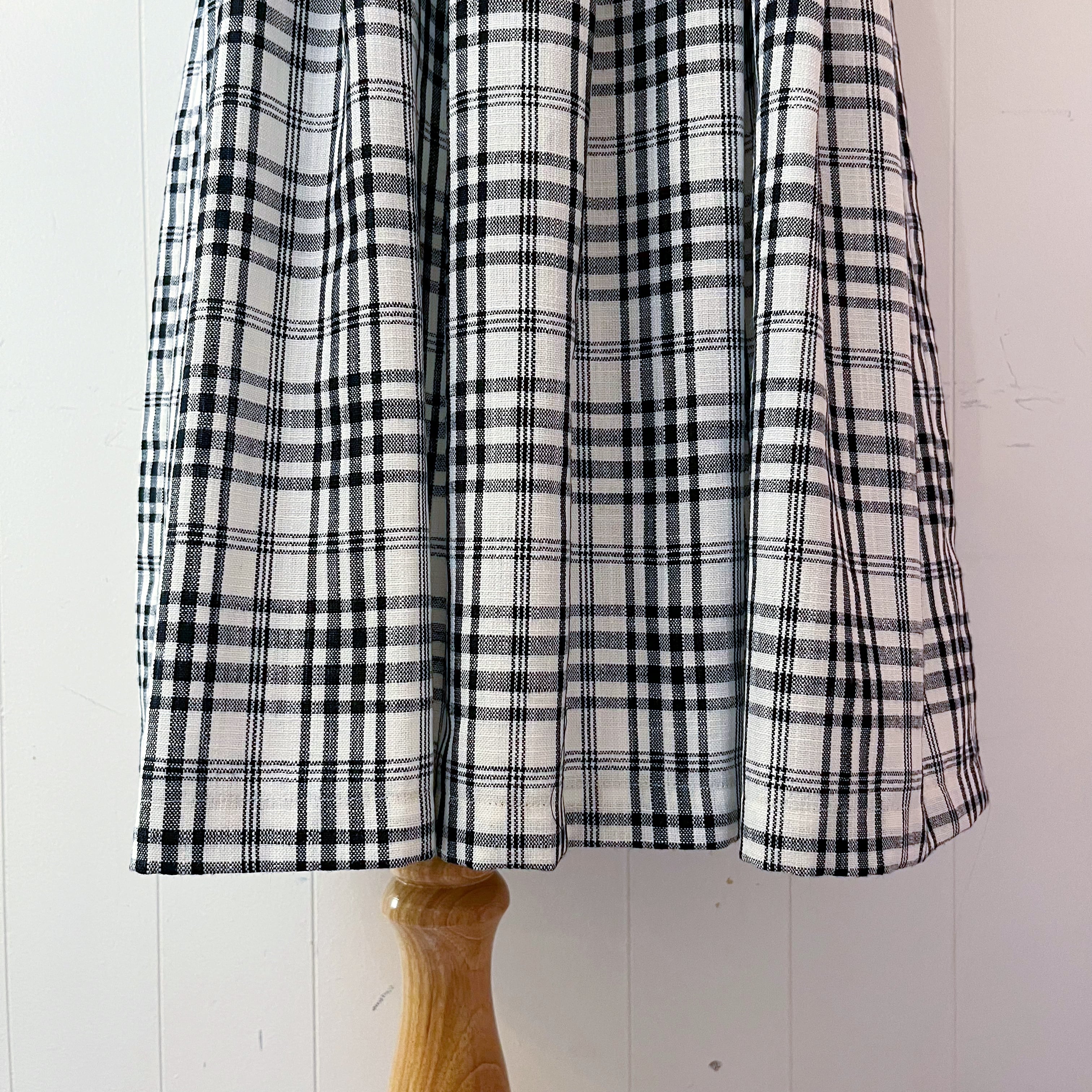 flower ribbon brooch check jumper skirt
