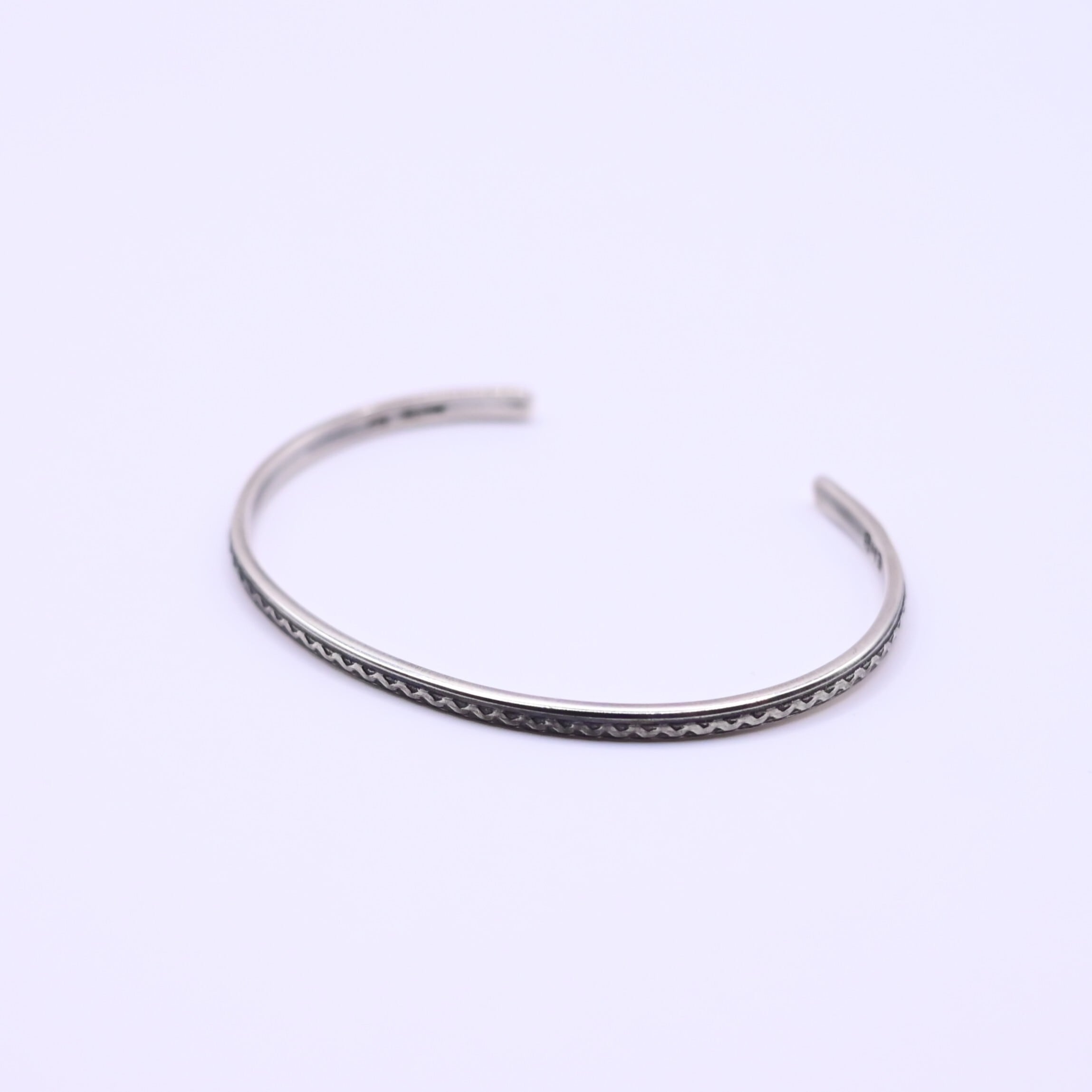 ERICKA NICOLAS BEGAY / STAMP BANGLE-02(L) | GANKO