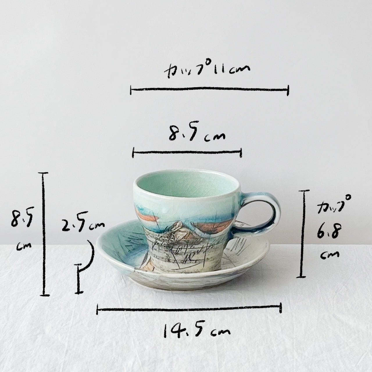 陶器製の抽象模様カップ 線刻カップ＆ソーサー【水色】 | Kamani | 多治見で営む 美濃焼器のWeb