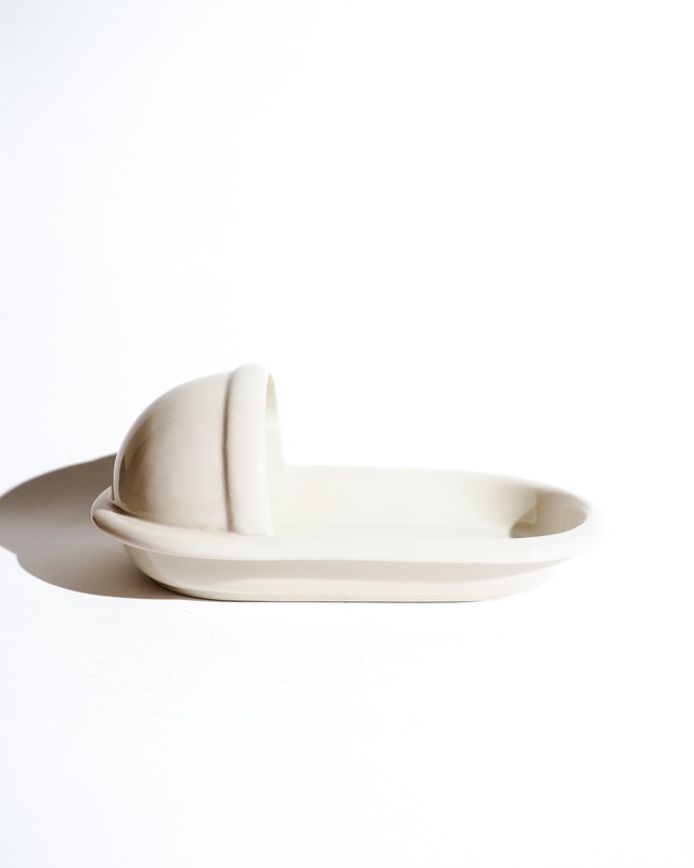 Ceramic container for a pit toilet