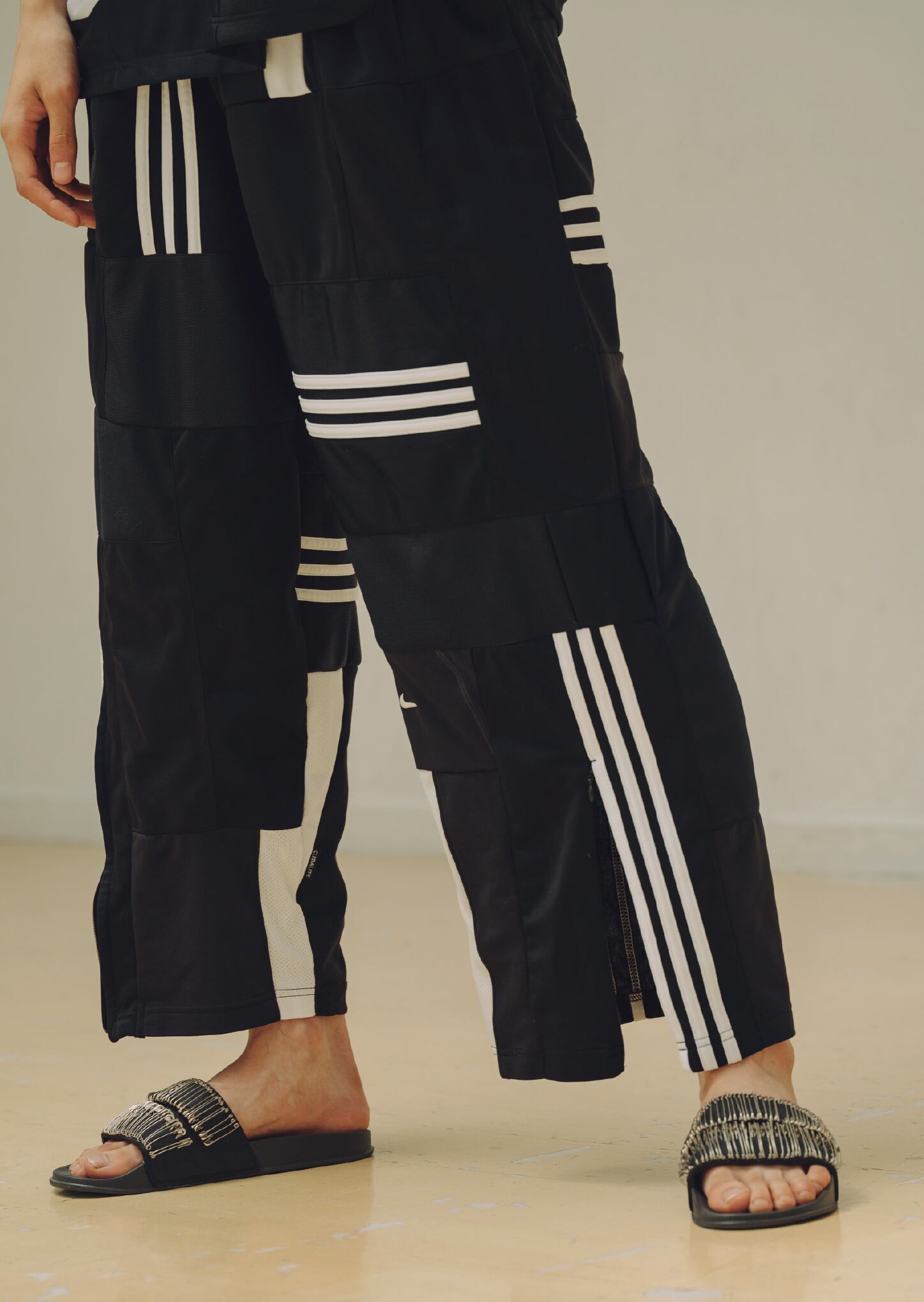 Sport material mix patchwork wide track pants  -スポーツマテリアルミックスパッチワークワイドトラックパンツ- | NEO ROMANTIC CINEMA CLUB