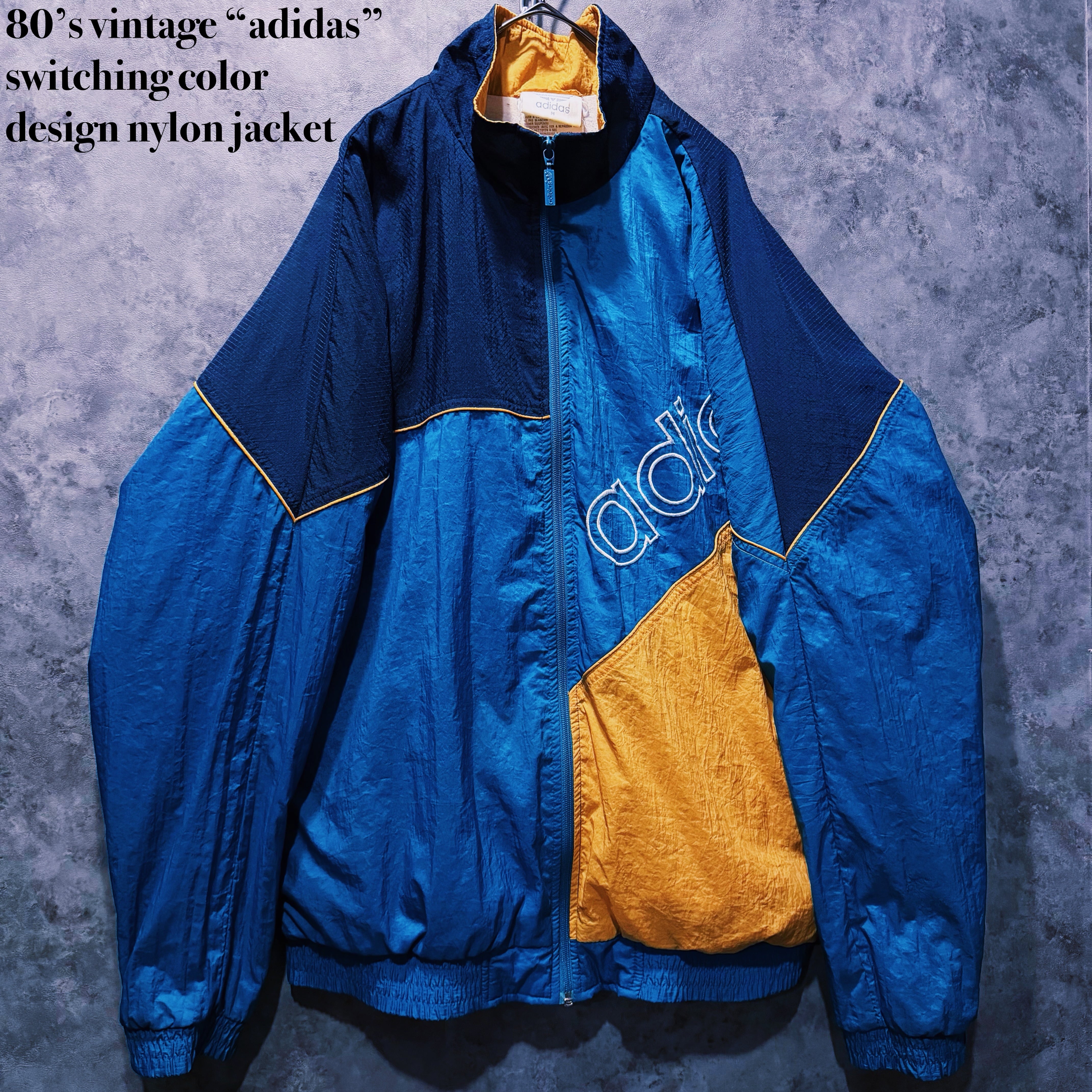 【doppio】80’s vintage “adidas” switching color design nylon jacket