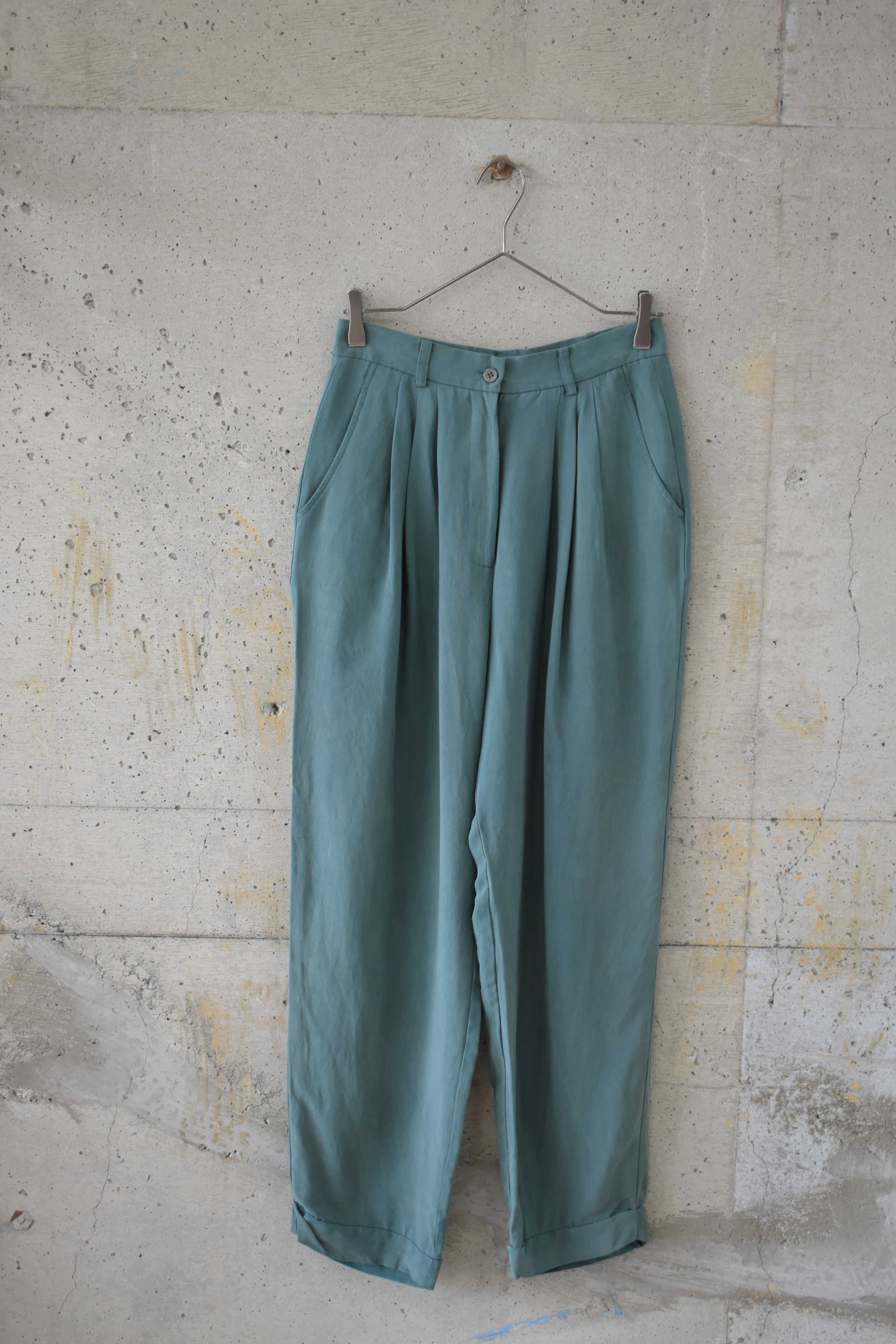 Green silk slacks