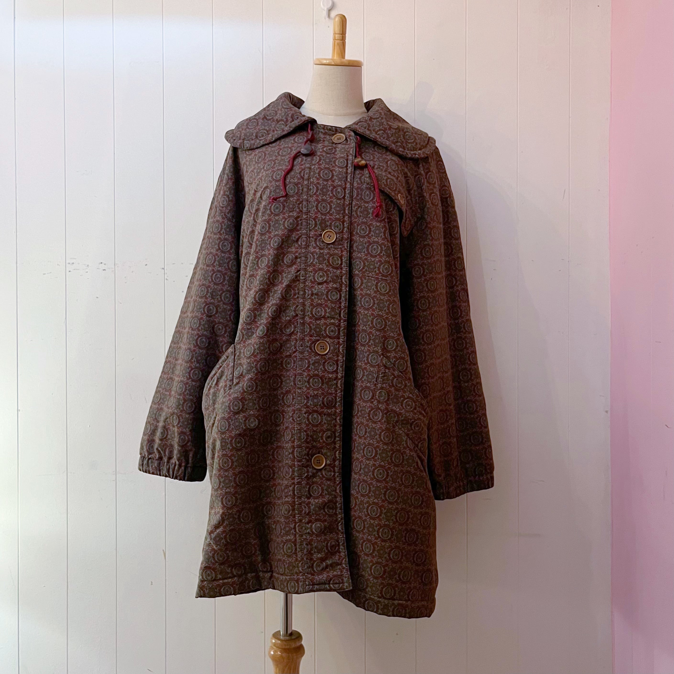 round collar geometric drawstring coat
