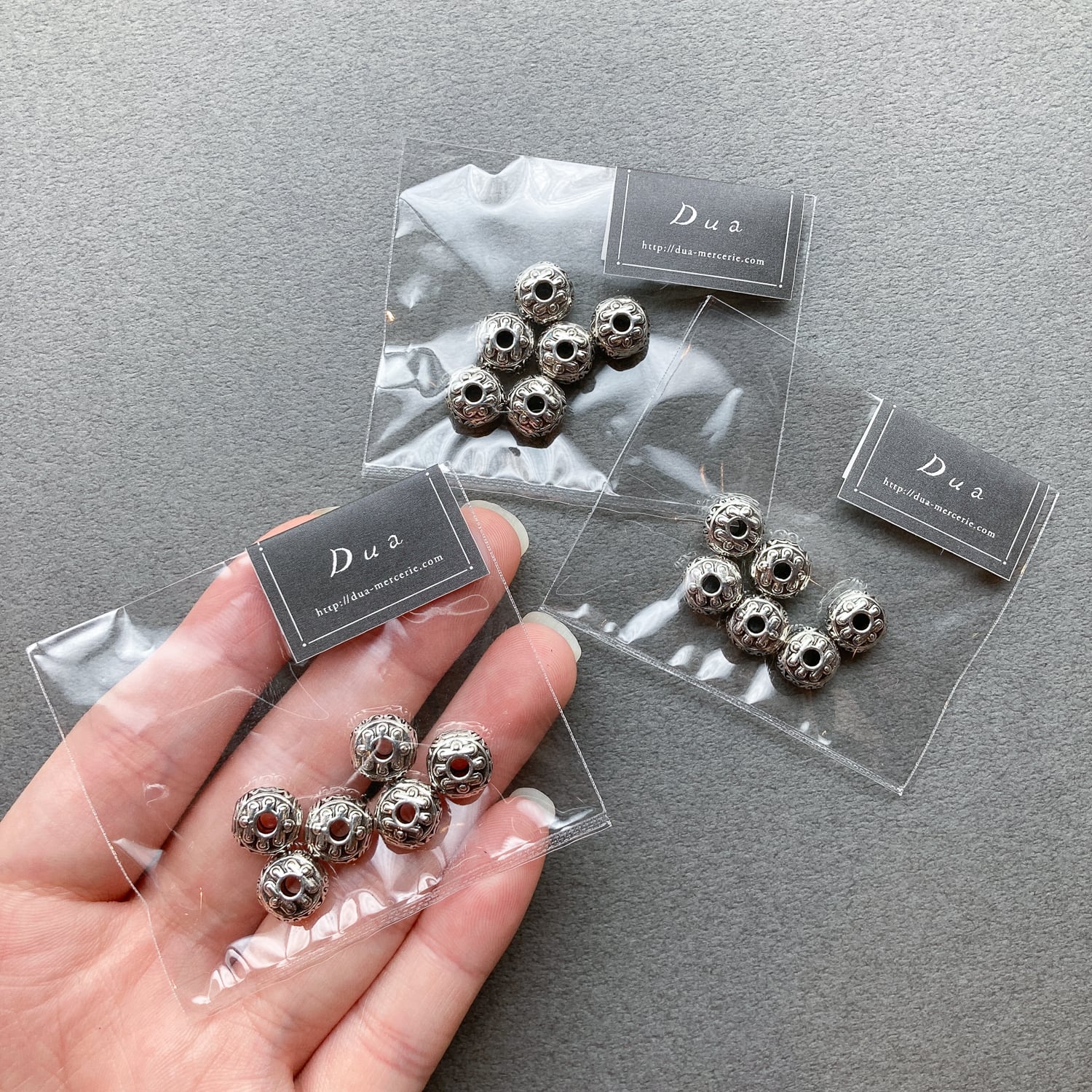 再入荷〉いびつ模様入ロンデルメタルビーズパック（6p） | Dua