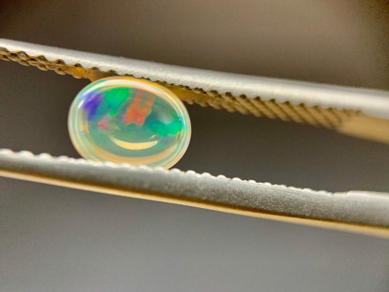 ファイヤーオパール 0.451ct オレンジ遊色 簡易ソーティング付き