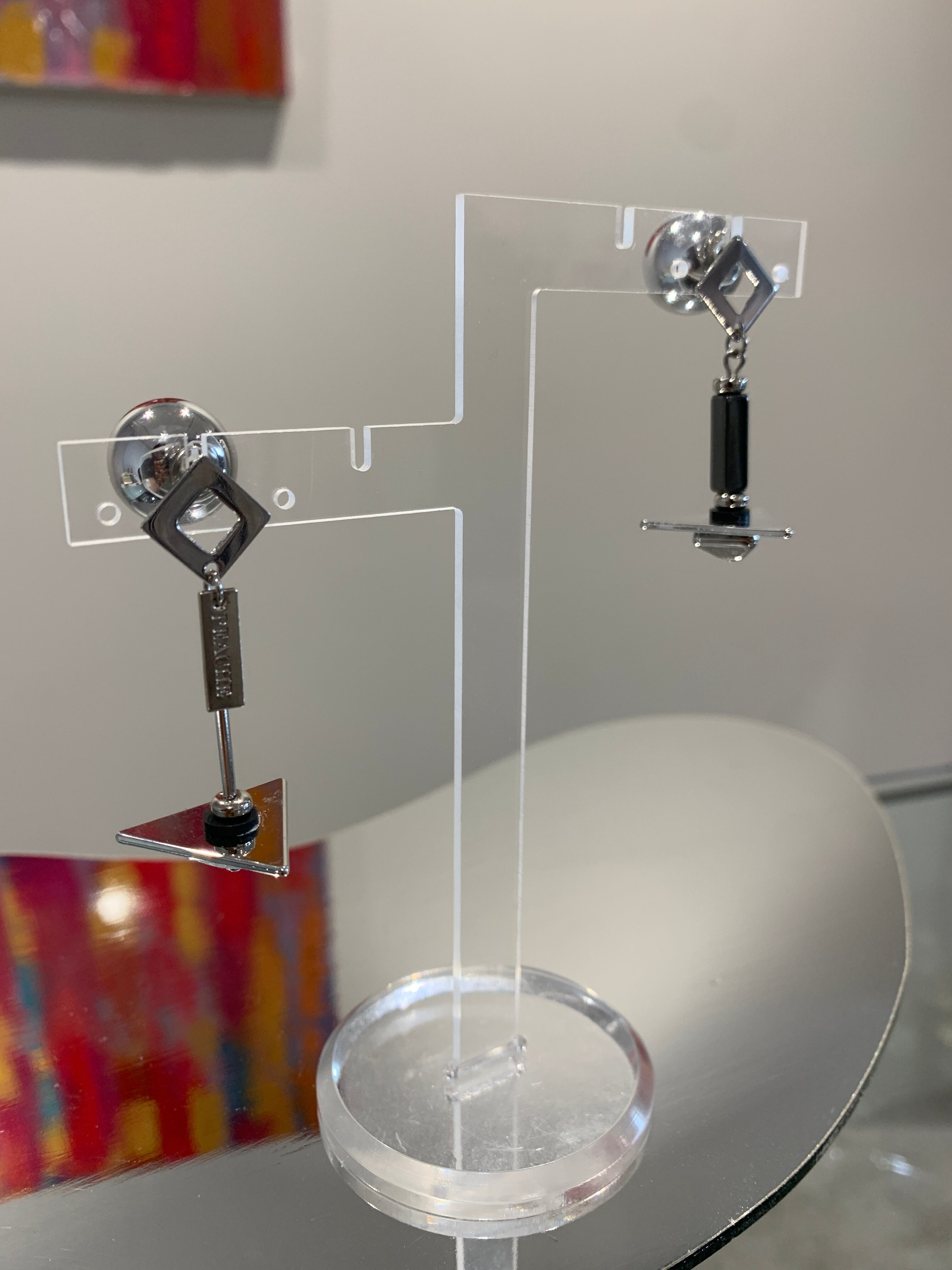 silver triangle motif