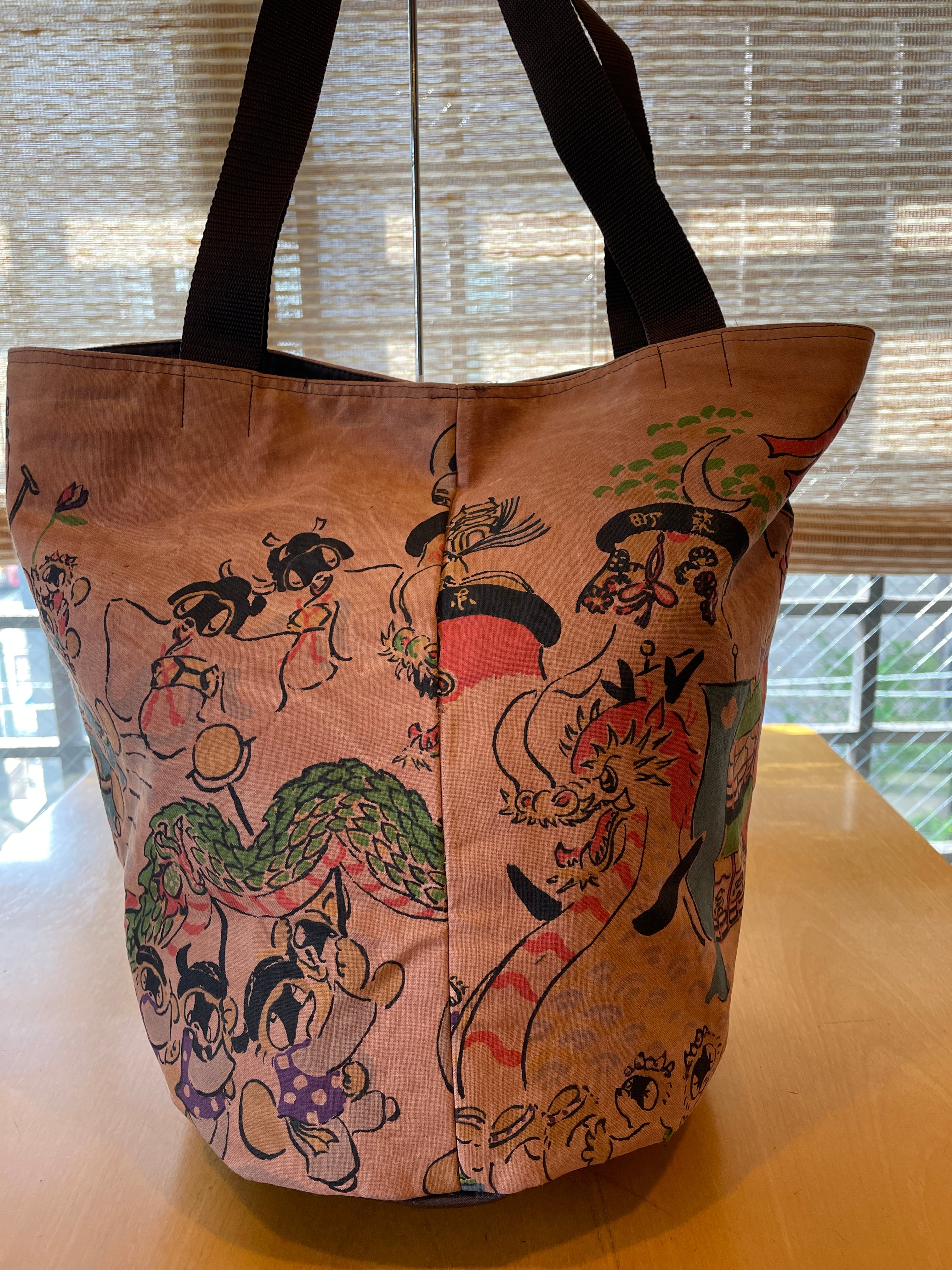 長崎くんち たぬき絵 昭平会 トートバッグ（丸）（柿渋染め） | Pay ID