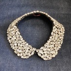 A collar with lots of jewels