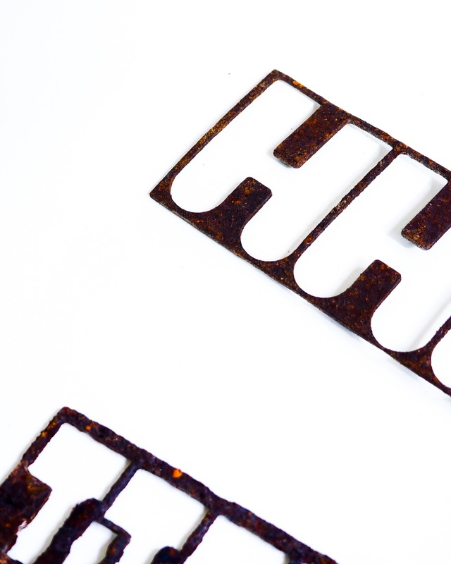Frame with geometric, regular, die-cut patterns
