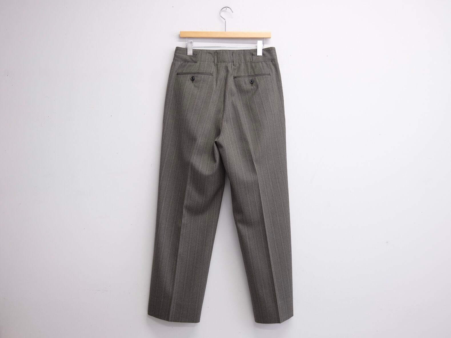 ULTERIOR” MELANGE HERRINGBONE STRIPE TUCKED TROUSERS” | Lapel