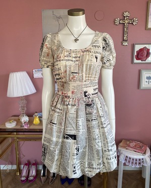 newspaper dress with blood detail