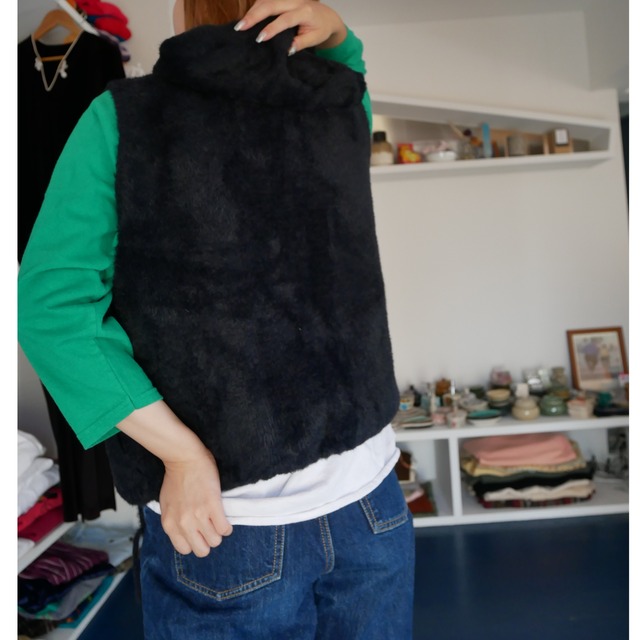 Fluffy  hooded  vest