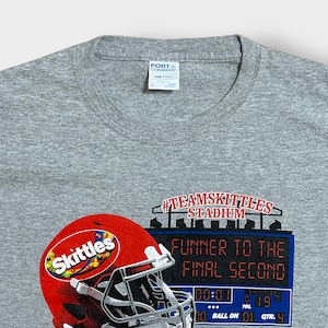 【PORT&COMPANY】Skittles スキットルズ アメフト TEAMSKITTLES 企業系 ロゴ Tシャツ 袖ロゴ サークルK CIRCLEKプリント L イラスト グレー 半袖 夏物 us古着