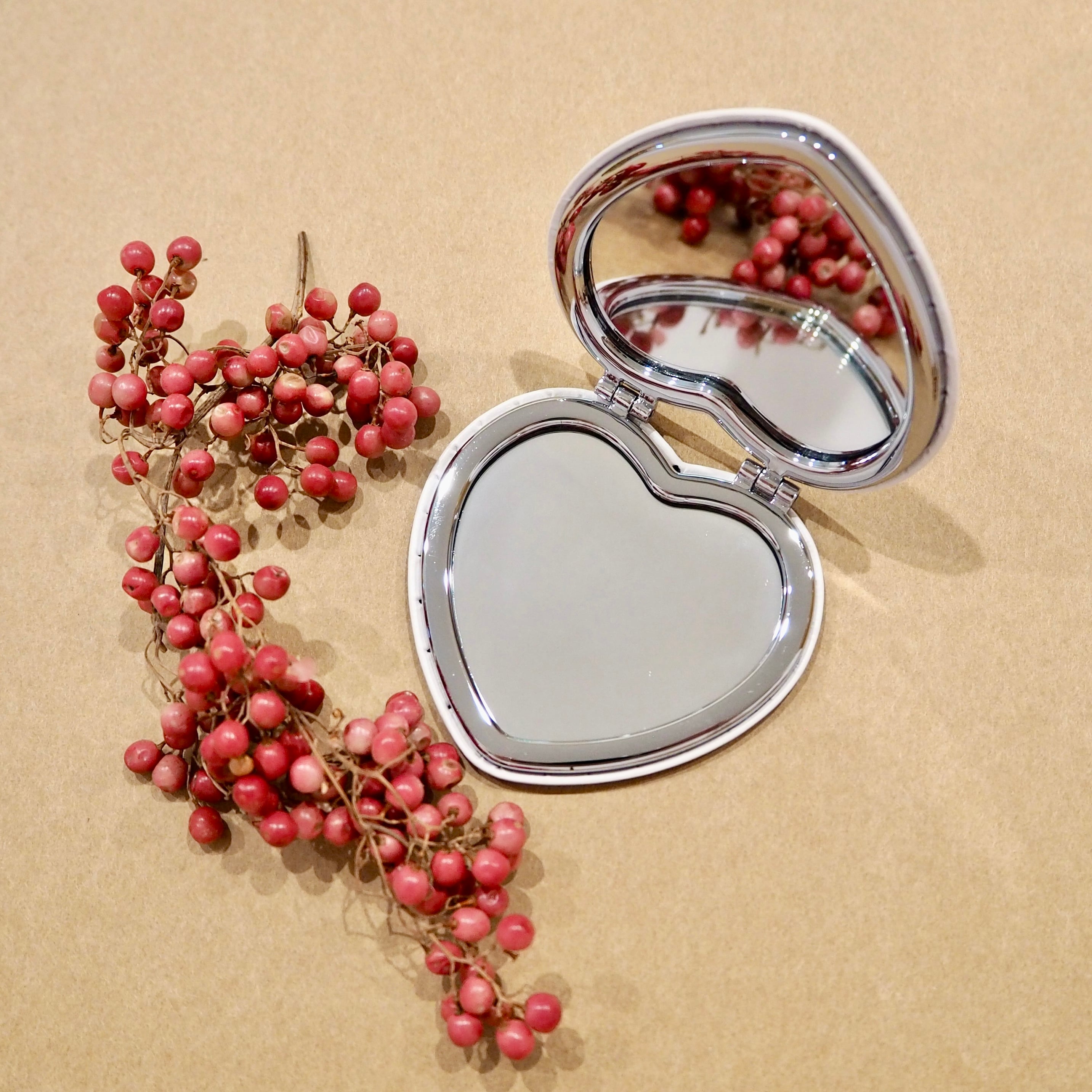 her compact mirror
