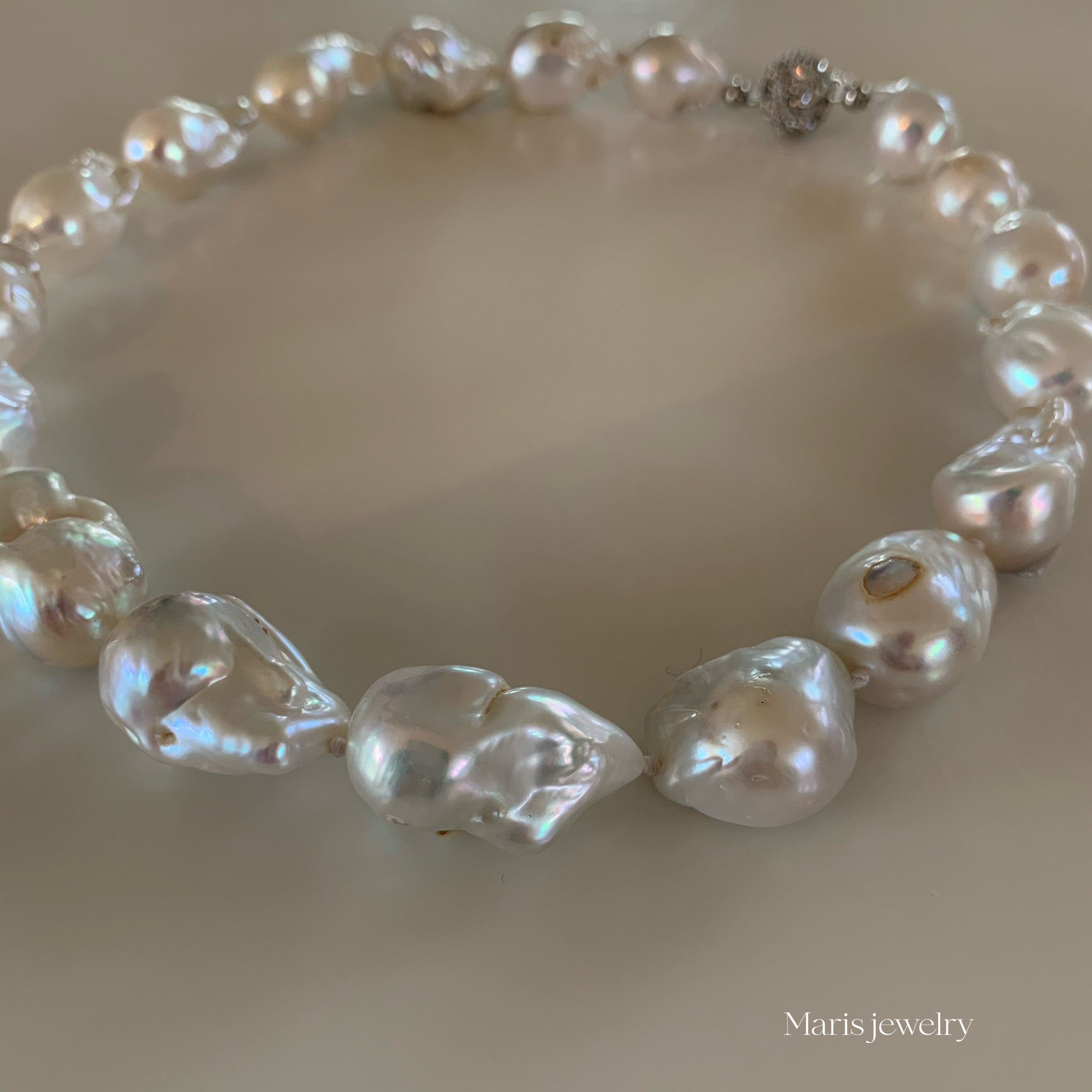 Maris】K10ムーンパールネックレス anq.】K10・0.03ctダイヤモンド