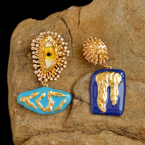 vintage asymmetric evil eye stud pierces<a3247>