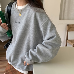 simple letter embroidered round neck velvet sweater