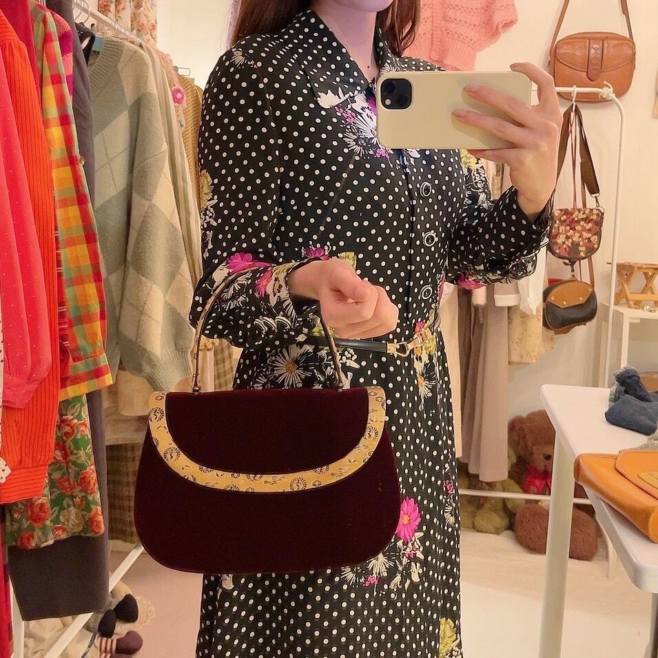 bordeaux ellipse hand bag