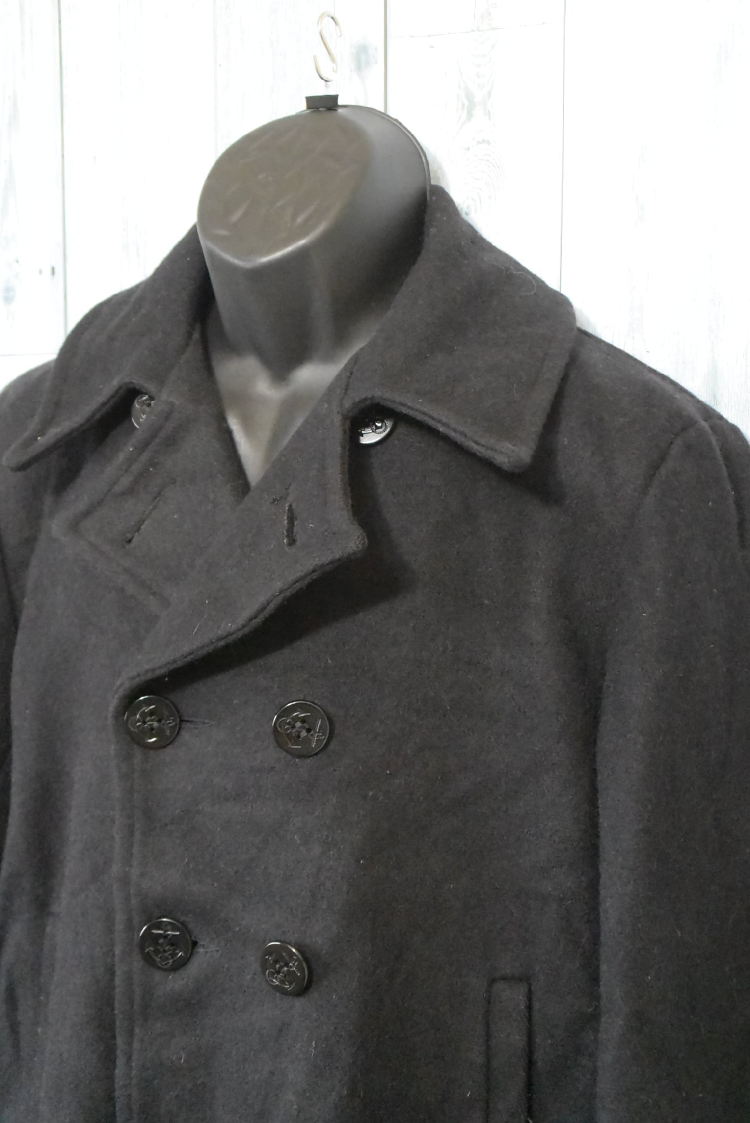 韓国版の厚い保温性の男性の秋冬のコートの中で長めの格好が良いコート 