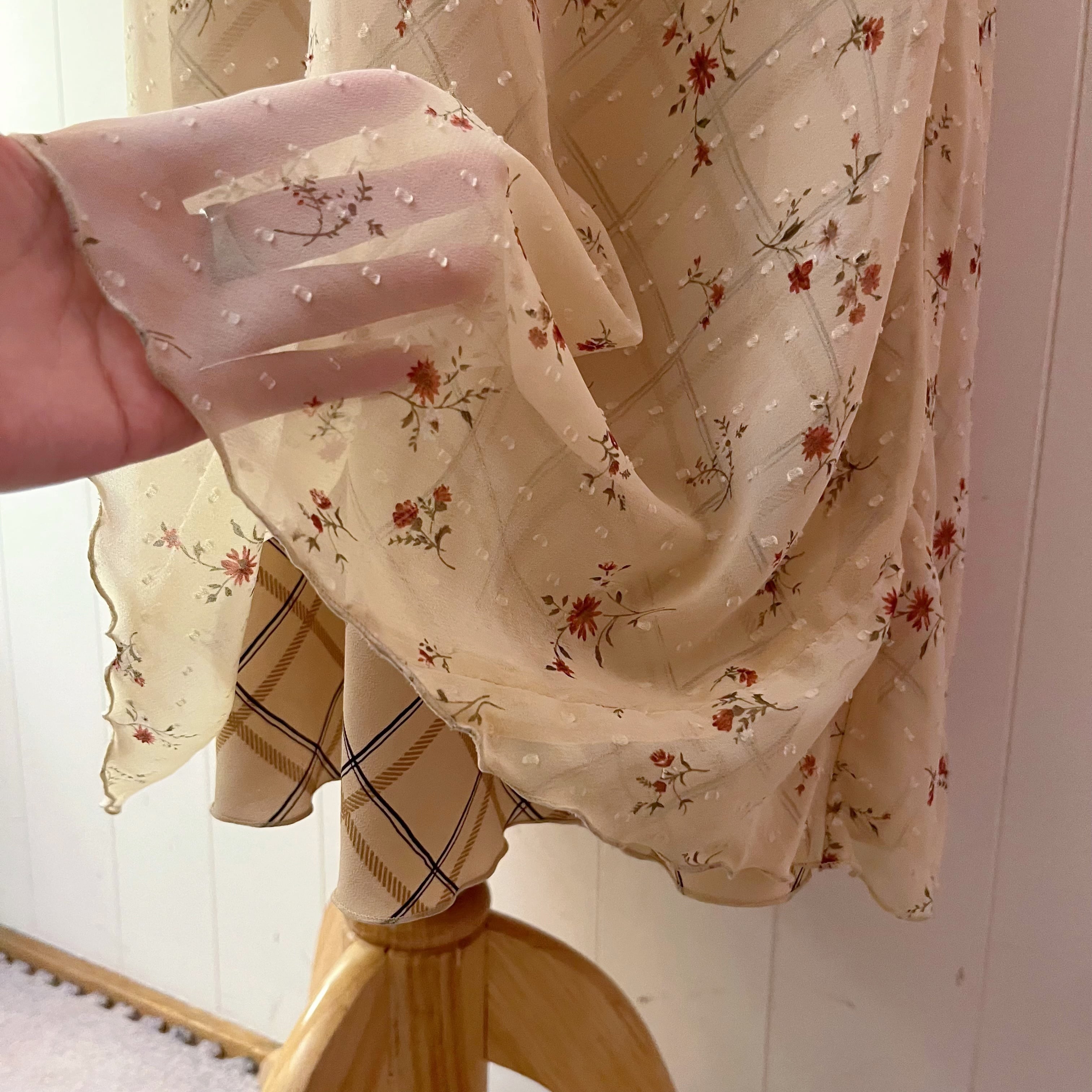 flower check sleeve less one-piece