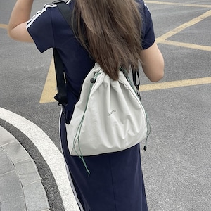 ナップサック ナイロン レディース 大容量 A4 軽量 韓国 シンプル 巾着バッグ 大人 カジュアル 通勤 通学 旅行 アウトドア レジャー マザーズバッグ 大人可愛い 大人女子