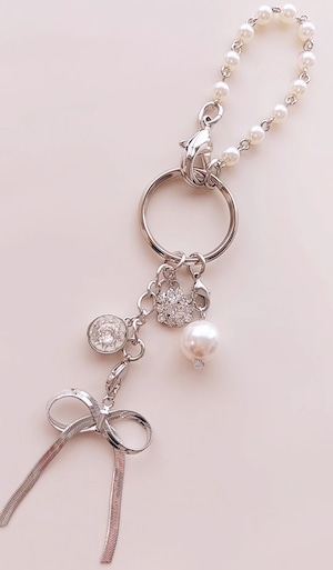 metal ribbon bag charm