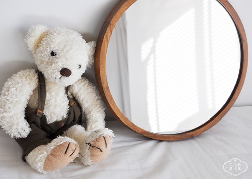 Acoustic wood wall mirror.