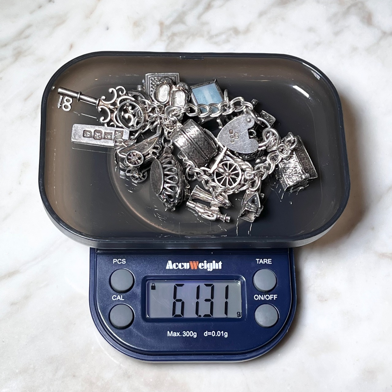 vintage heavy gauge UK silver charm bracelet