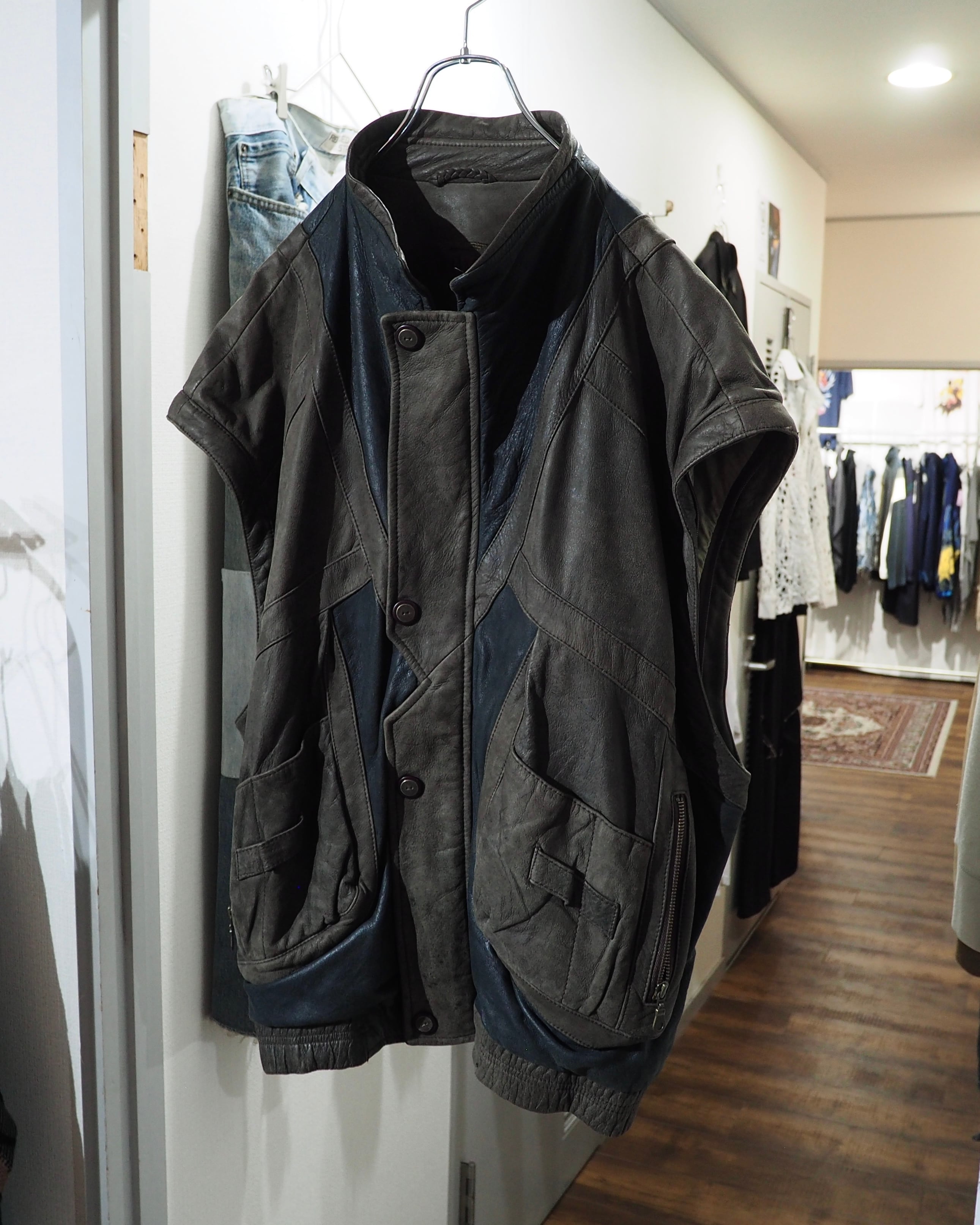 " 変形 × 分離 " Sleeve Detachable Gimmick × Panel Switching Vintage Loose Leather Jacket