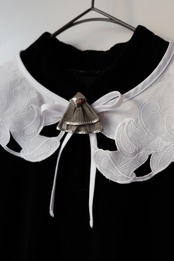 Silver frilled dress clip