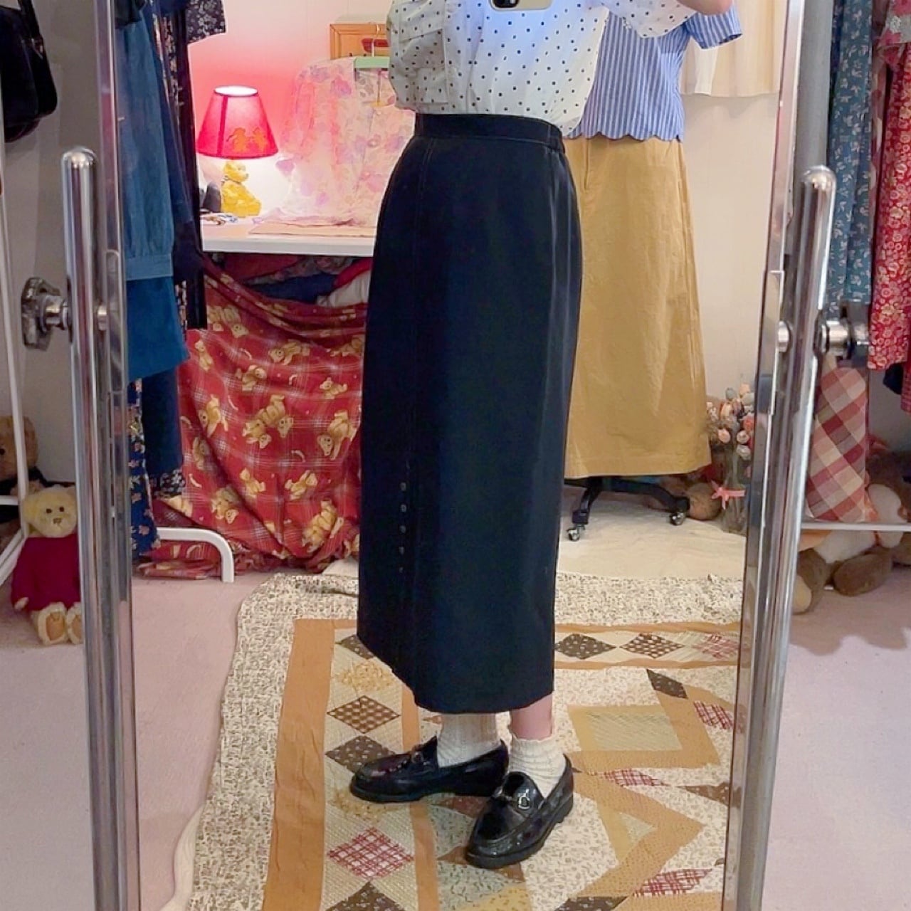 front slit button black skirt