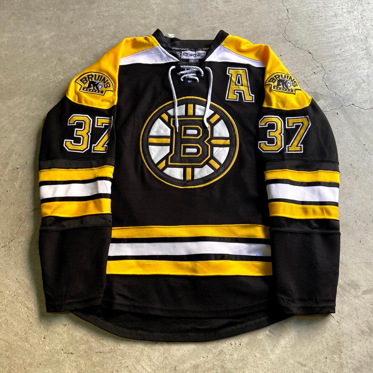 Reebok リーボックCCM NHL ボストン・ブルーインズ 　Boston Bruins　ゲームシャツ ホッケーシャツ ユニフォーム メンズ48  XL相当　古着【ゲームシャツ】 | cave 古着屋【公式】古着通販サイト powered by BASE