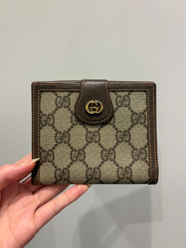 GUCCI/ vintage monogram gold GG wallet.