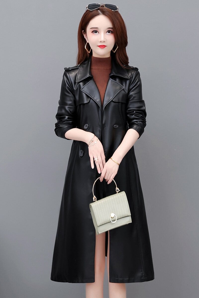 秋の革のコートの女性ロンググリーンサッシダブルブレスト拡張革風