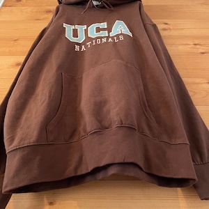 【 UCA】カレッジ 大学 スウェット パーカー チアリーディング 刺繍ロゴ アメリカ古着