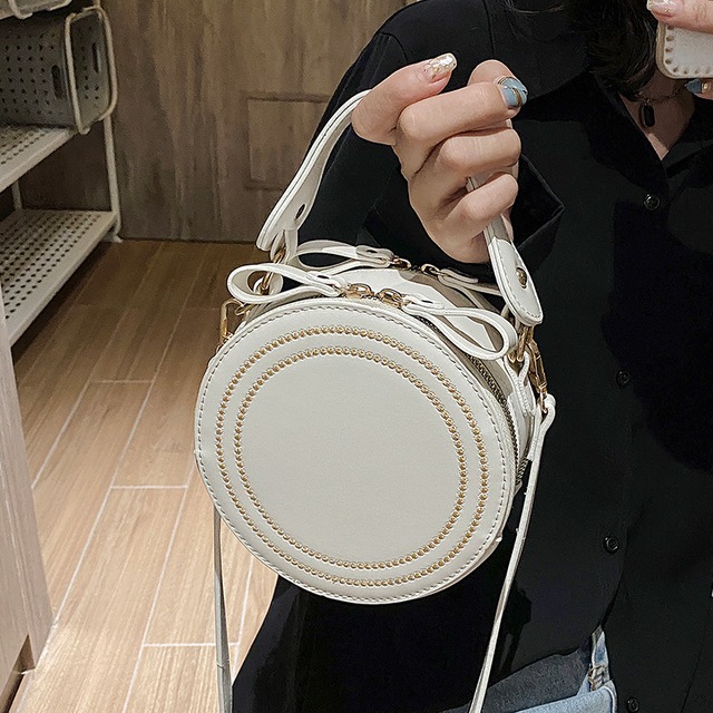 センススモールバッグ女性2020人気の新しい流行のファッションワイルドワンショルダーメッセンジャーバッグネットレッドポータブルスモールラウンドバッグ 手作りハンドバック20890968484